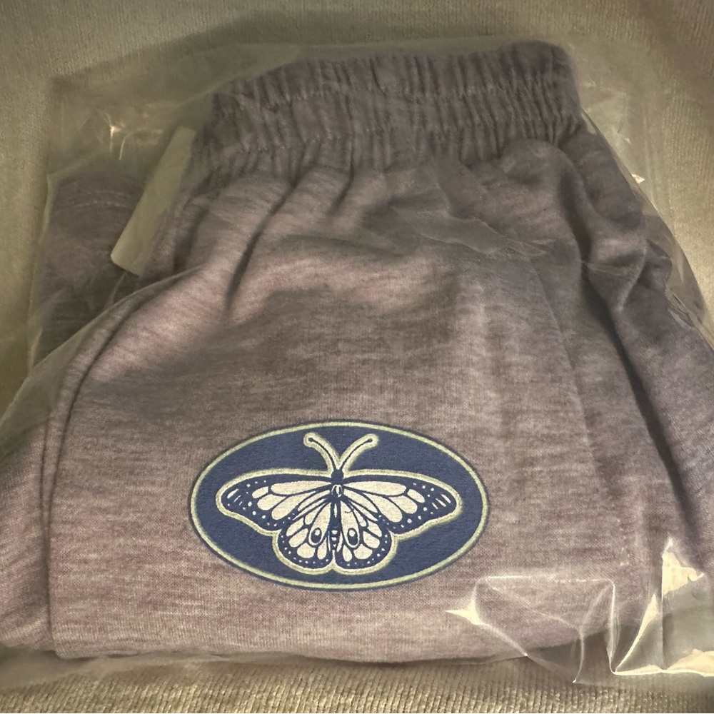Girls grey joggers with butterfly detail by crown hearts